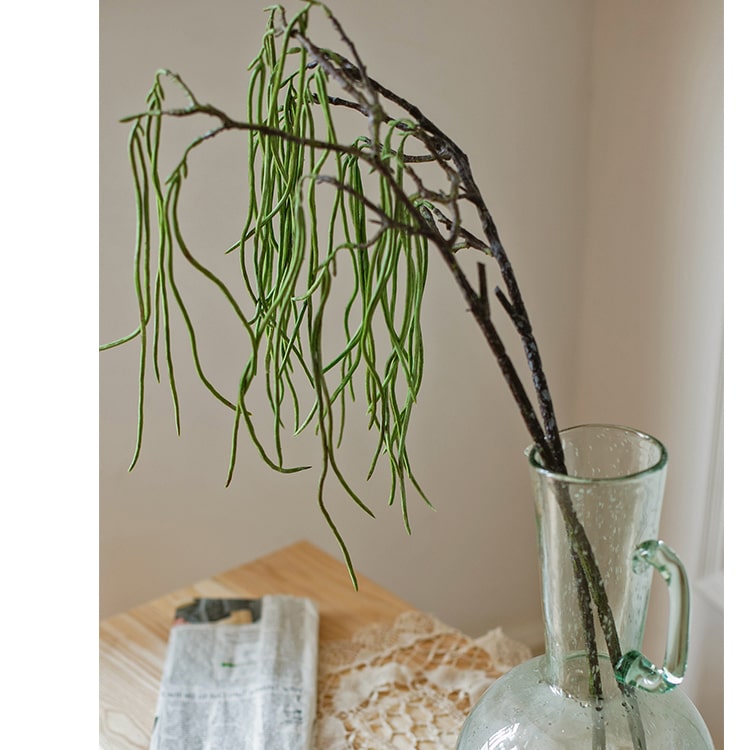 A 29-inch tall artificial faux let fall plant stem featuring realistic green, gray, and white grass, perfect for home or office decor.