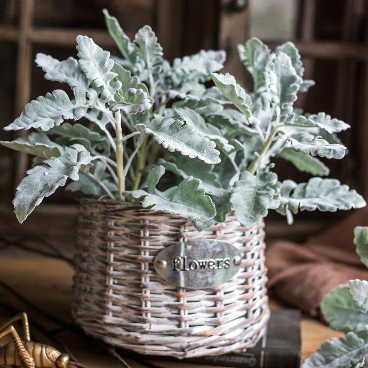 A collection of Artificial Faux Plant Wild Leaf Stems in varying heights, showcasing realistic green and gray silk leaves.