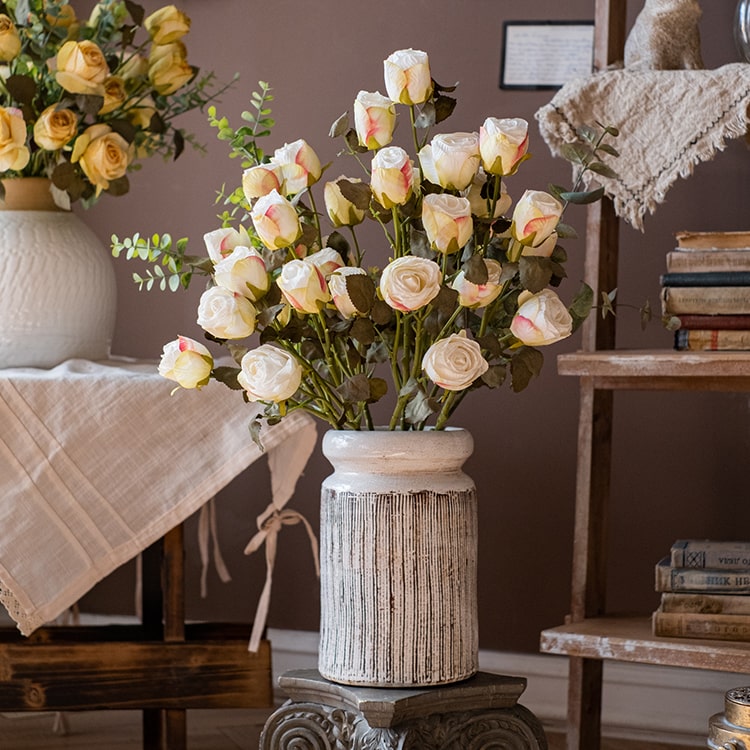 A tall 23-inch artificial faux silk dry rose stem in white and yellow, featuring five realistic blooms and a sturdy stem, perfect for home decor.