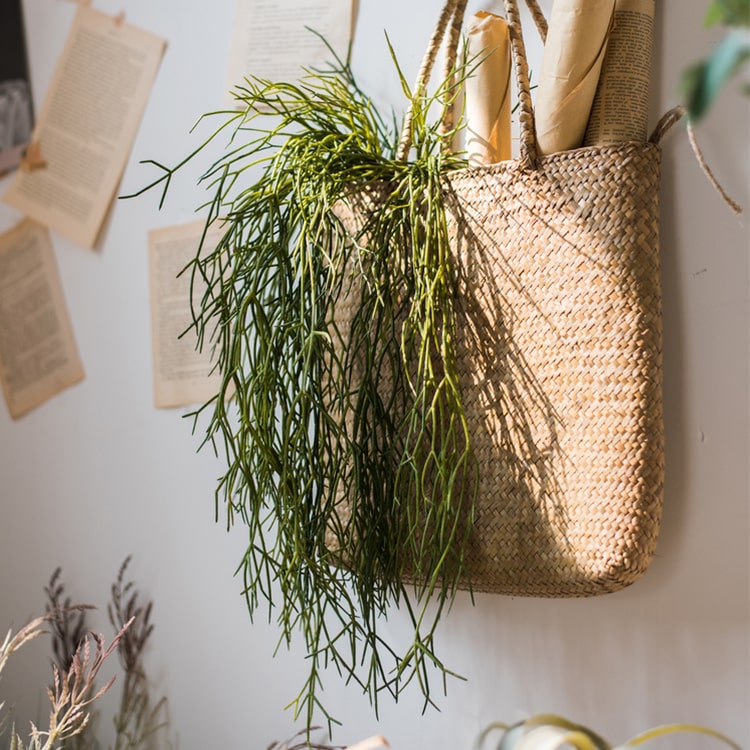 A 22-inch long Artificial Faux Usnea Vine Stem with realistic green tendrils, perfect for hanging planters and home decor.