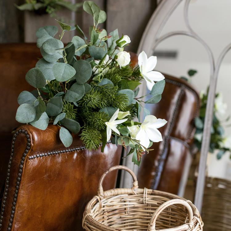 A vibrant 20-inch tall artificial flower bouquet featuring Clematis flowers and lush greenery, perfect for home decor.