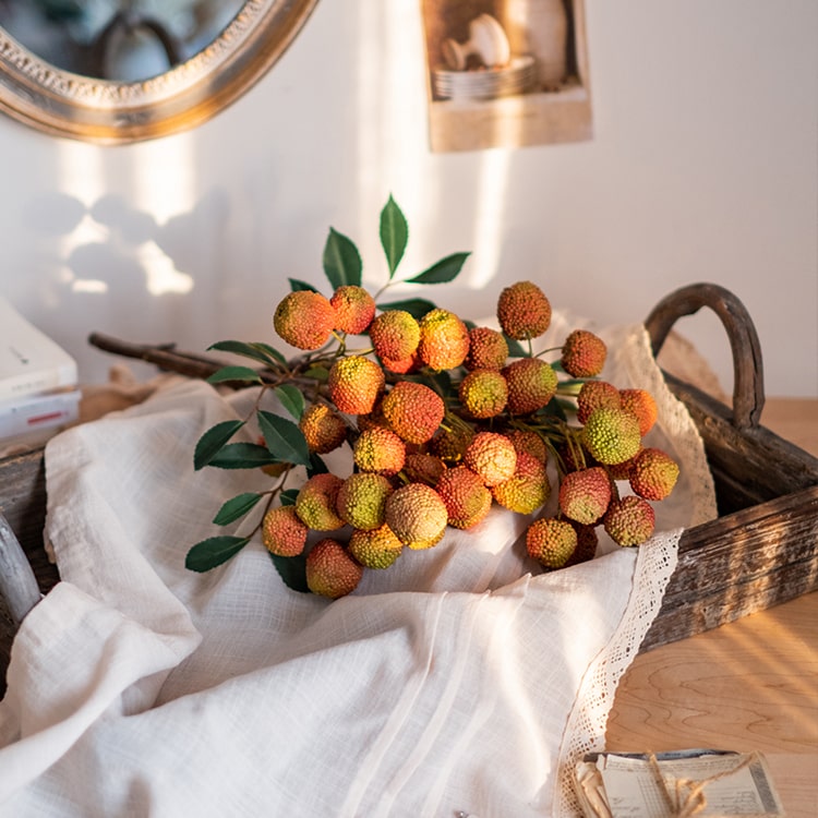 A 27-inch tall artificial lychee stem silk plant featuring vibrant yellow and red colors, designed for home and office decor.