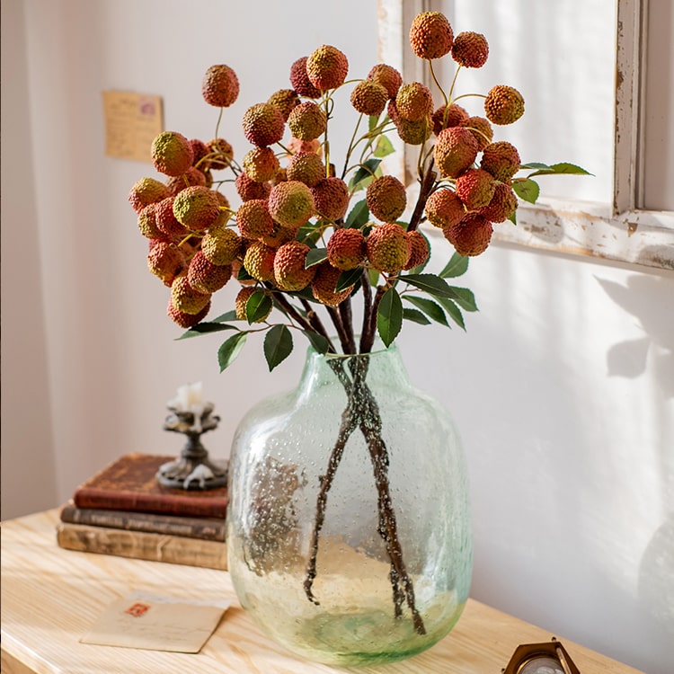 A 27-inch tall artificial lychee stem silk plant featuring vibrant yellow and red colors, designed for home and office decor.