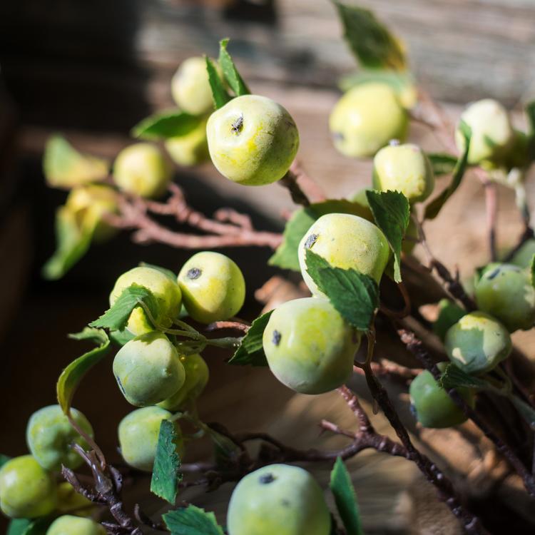 A vibrant 23-inch tall artificial fruit mini apple stem featuring multiple green apples, perfect for home decor.