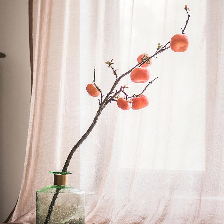 A 43-inch tall artificial fruit stem featuring six vibrant orange persimmons, perfect for home decor.