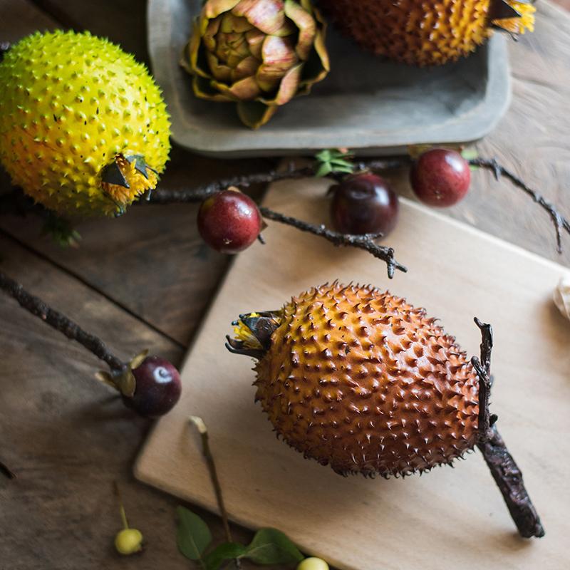 Set of 3 artificial thorn pears in vibrant colors, showcasing realistic texture and design, perfect for home decor.