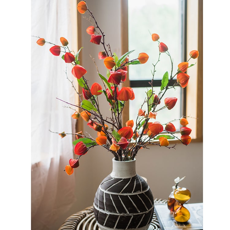 Artificial Makino Fruit Stem in vibrant orange-red, 39 inches tall, featuring realistic silk leaves and fruit.