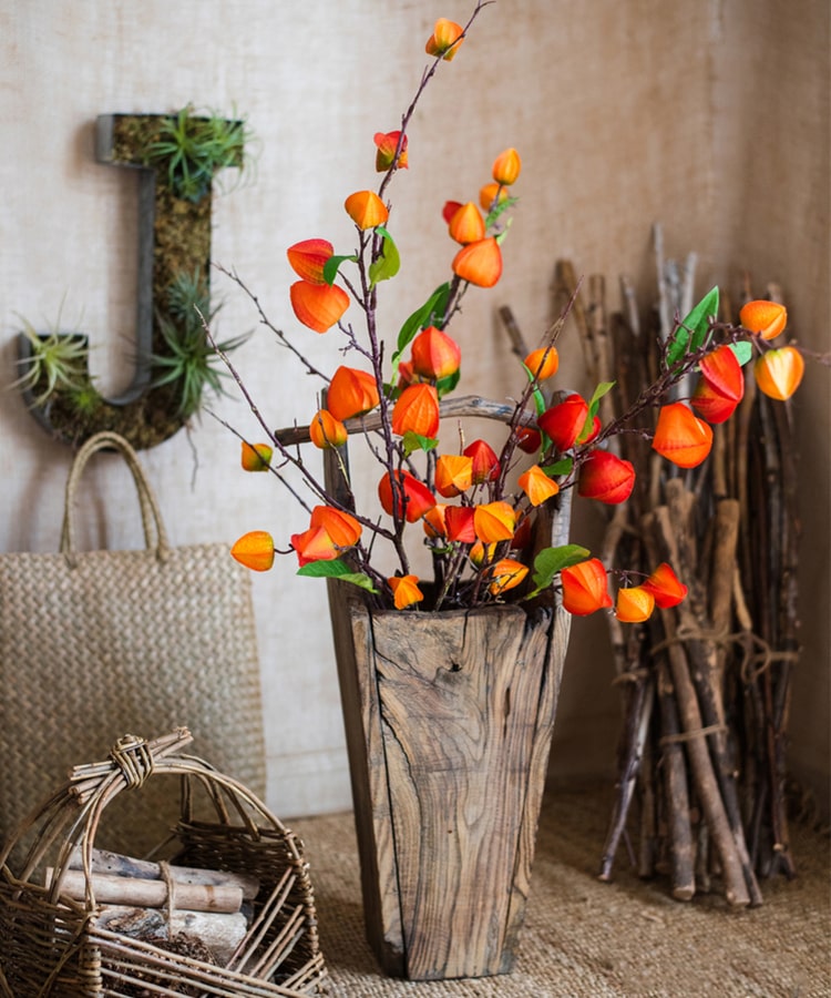 Artificial Makino Fruit Stem in vibrant orange-red, 39 inches tall, featuring realistic silk leaves and fruit.