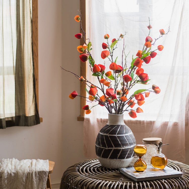 Artificial Makino Fruit Stem in vibrant orange-red, 39 inches tall, featuring realistic silk leaves and fruit.