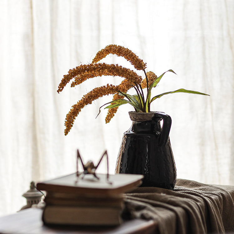 A 19-inch tall artificial millet bundle featuring vibrant brown, orange-brown, yellow, and green leaves, perfect for home decor.