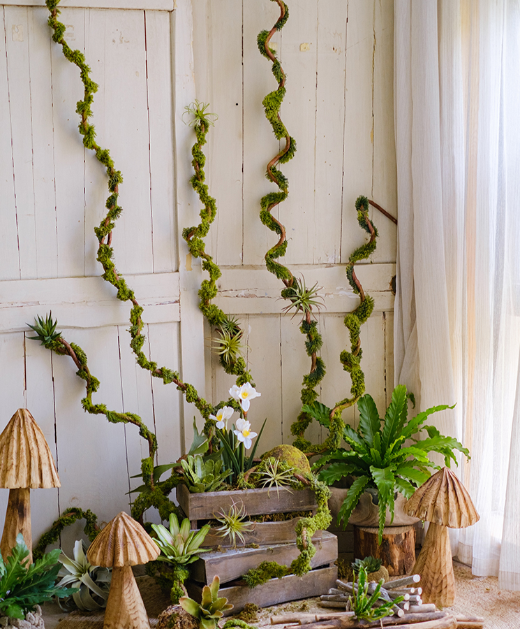 Artificial Moss Rattan Vine in green and brown, showcasing its realistic faux moss and rattan design, perfect for home decor.