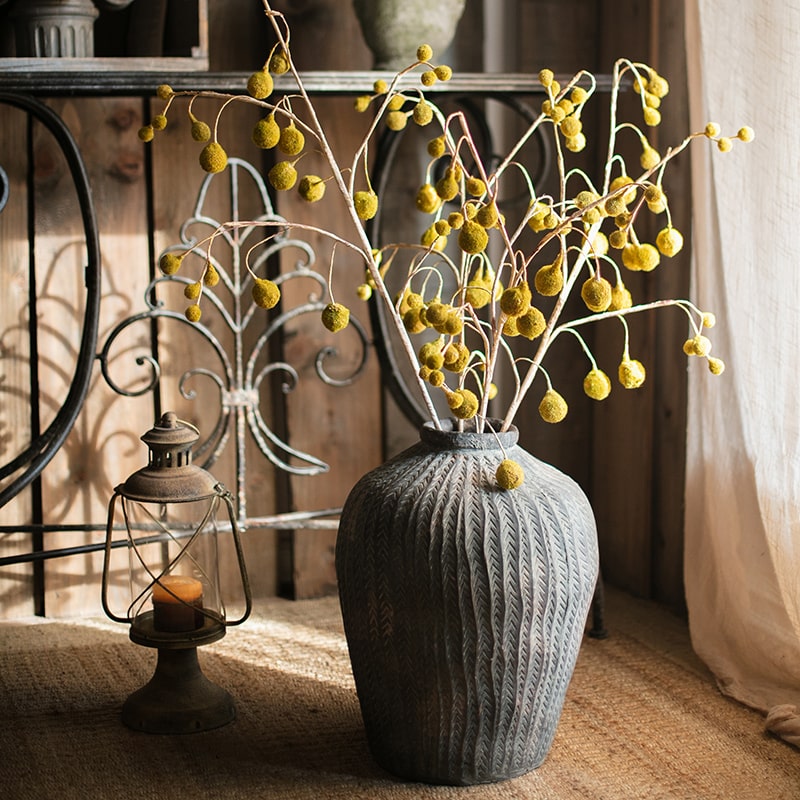 A tall 48-inch artificial Plane Tree fruit stem with vibrant yellow color, showcasing realistic fruit details and lush foliage.