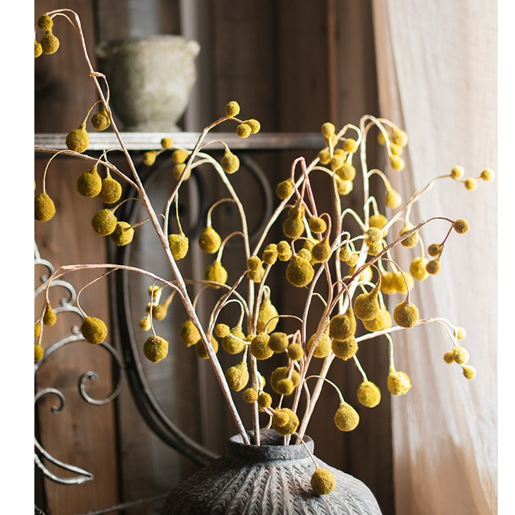 A tall 48-inch artificial Plane Tree fruit stem with vibrant yellow color, showcasing realistic fruit details and lush foliage.