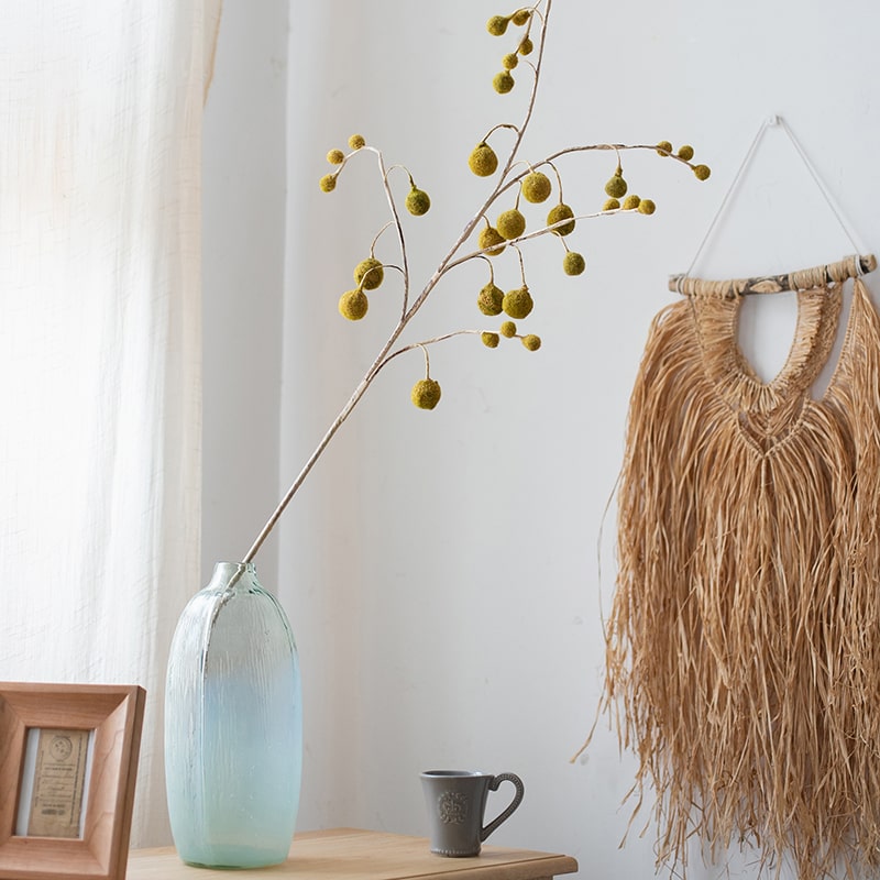 A tall 48-inch artificial Plane Tree fruit stem with vibrant yellow color, showcasing realistic fruit details and lush foliage.