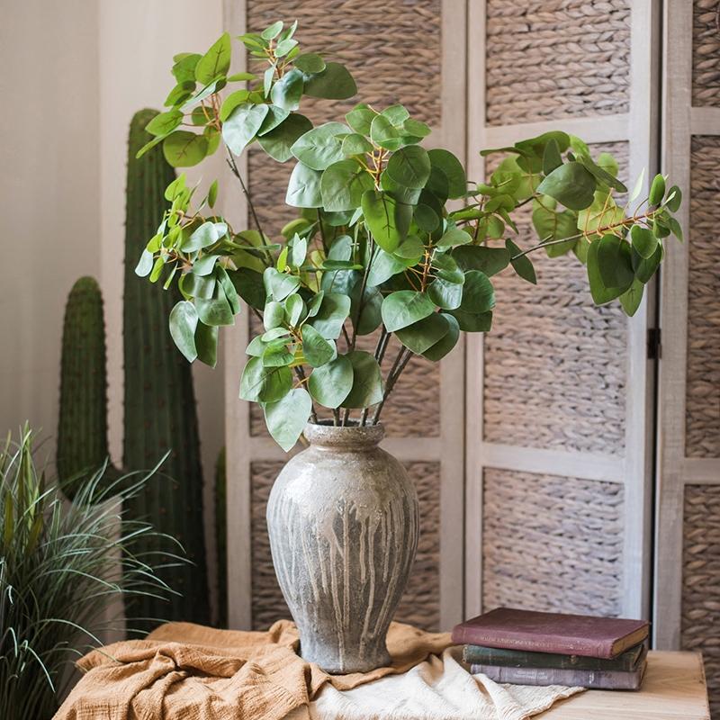 34-inch tall artificial Bauhinia leaf plant in vibrant green, showcasing realistic details and texture, perfect for home or office decor.