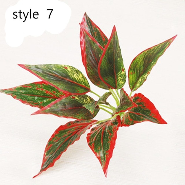 Artificial plant with green and red leaves.