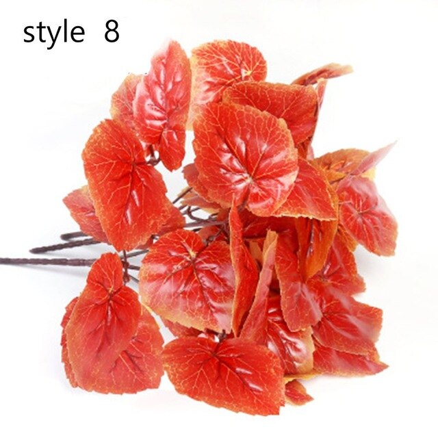 Red artificial autumn leaves bouquet.