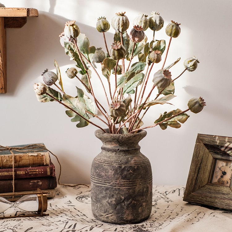 A 23.6-inch tall artificial poppy fruit stem with vibrant frosted green, purple, and yellow colors, featuring four realistic fruits on a sturdy stem.