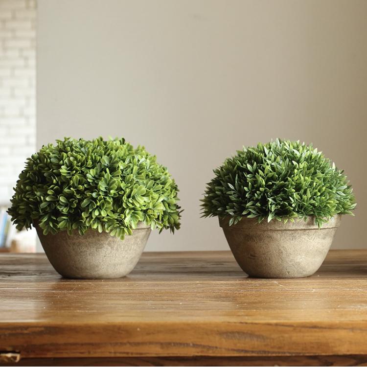 Artificial Potted Boxwood Faux Topiary in a decorative pot, showcasing vibrant green leaves and a realistic design.