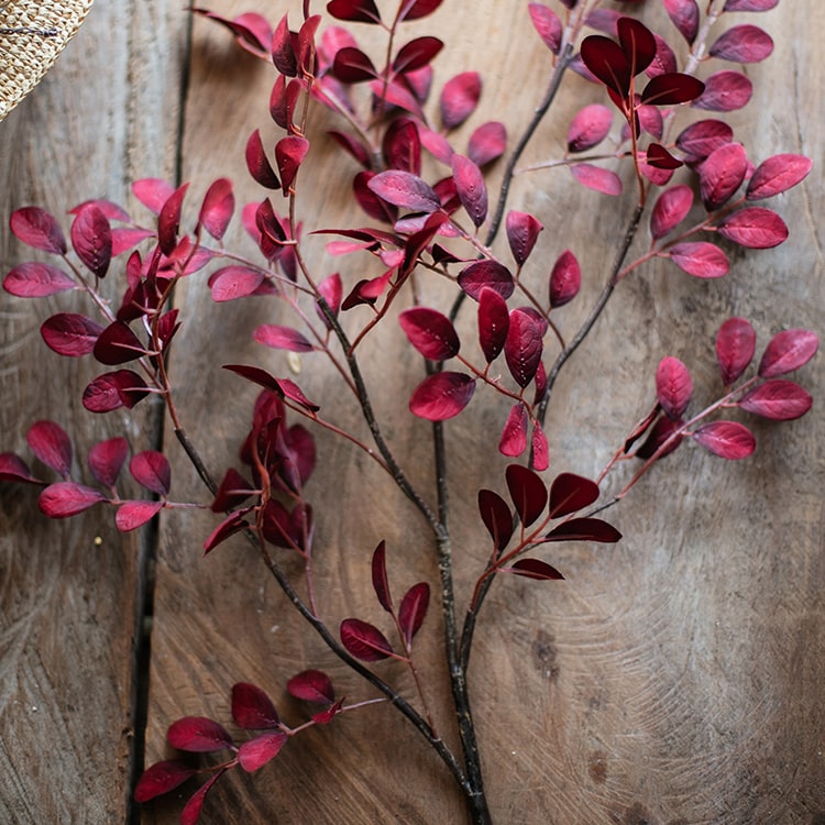 42-inch tall Artificial Red Tzu Tan Leaf Stem with vibrant red leaves and sturdy stem, perfect for home or office decor.