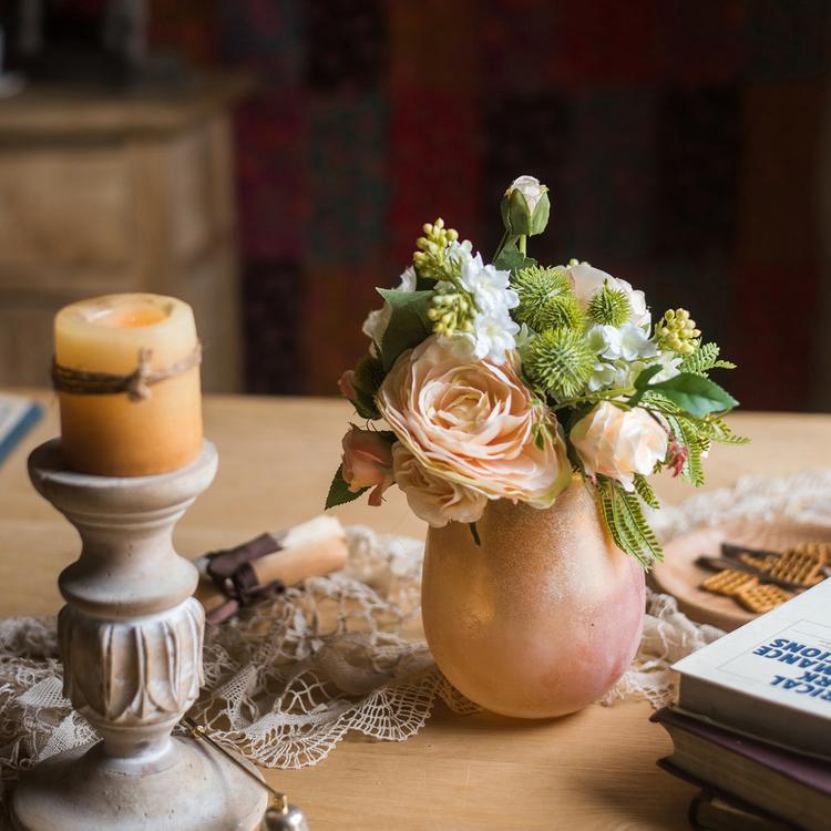 A beautiful 12-inch tall artificial silk flower bouquet featuring champagne roses, dahlias, and greenery, perfect for home decor and events.