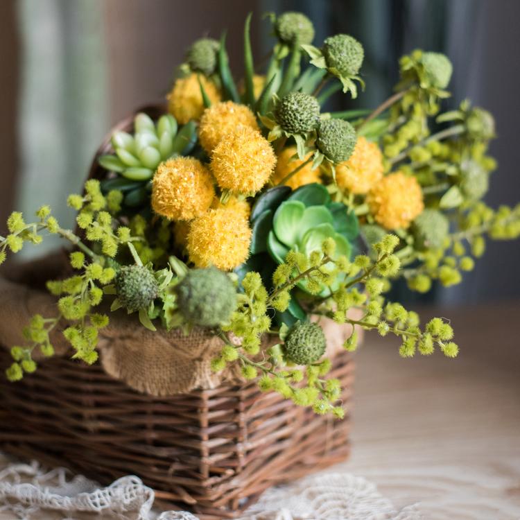 A vibrant 13-inch tall artificial silk flower bouquet featuring yellow dahlias and lush green leaves, perfect for spring decor.