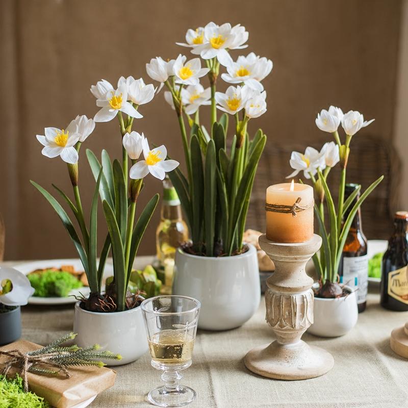 Artificial Silk Real Touch Daffodil Flower Bonsai in a ceramic vase, showcasing vibrant yellow and white petals with lush green leaves.