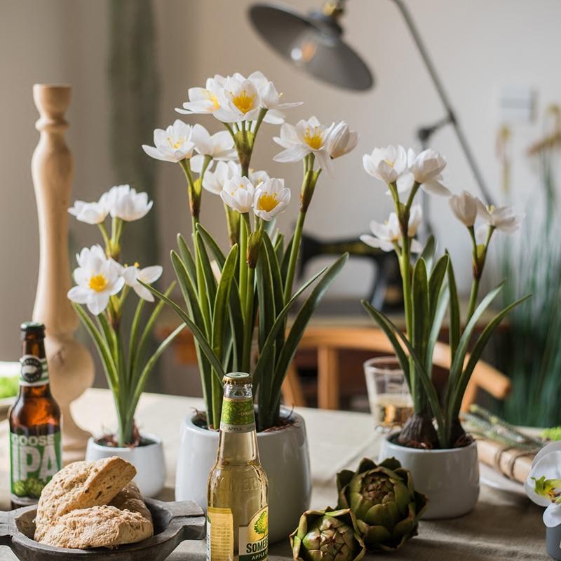 Artificial Silk Real Touch Daffodil Flower Bonsai in a ceramic vase, showcasing vibrant yellow and white petals with lush green leaves.