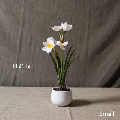 Artificial Silk Real Touch Daffodil Flower Bonsai in a ceramic vase, showcasing vibrant yellow and white petals with lush green leaves.