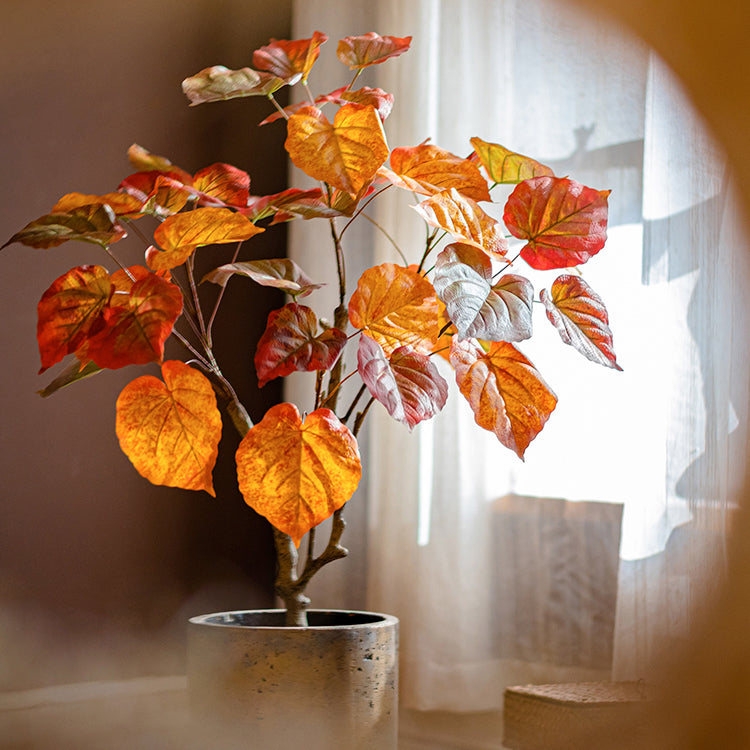 Artificial Silk Red Leaf Banyan Tree in a black pot, showcasing vibrant red leaves and a realistic design, perfect for indoor decoration.