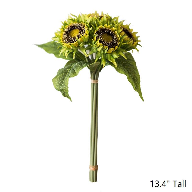 A vibrant artificial silk yellow sunflower bouquet, featuring seven flower stems with rich yellow petals and textured green leaves, standing 13 inches tall.