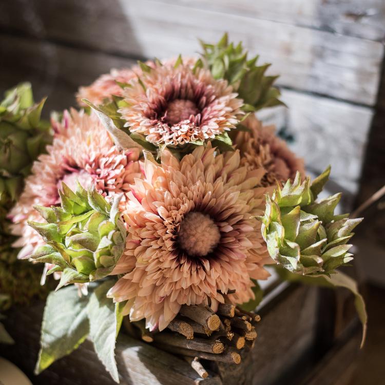 A vibrant 18-inch tall artificial sunflower bouquet in pink, featuring five flower stems and three bud stems, showcasing realistic details and colors.