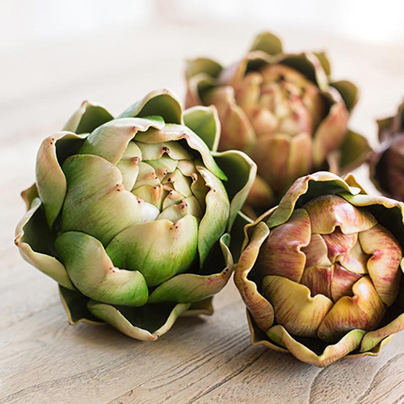 Set of 3 realistic artificial artichokes in vibrant colors, showcasing their lifelike texture and detail.