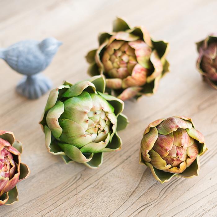 Set of 3 realistic artificial artichokes in vibrant colors, showcasing their lifelike texture and detail.