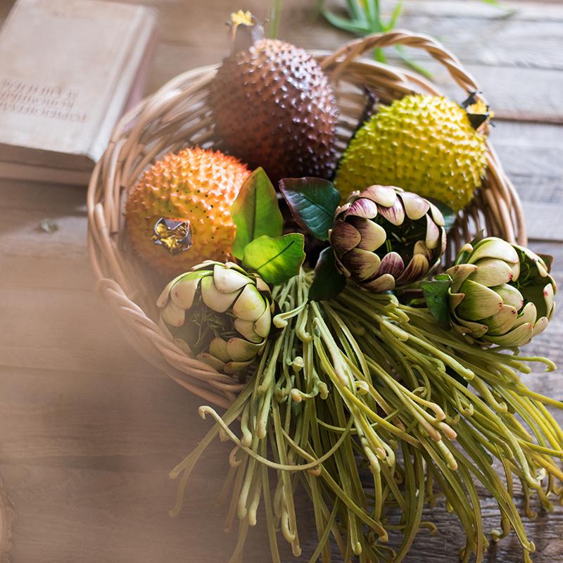 Set of 3 realistic artificial artichokes in vibrant colors, showcasing their lifelike texture and detail.