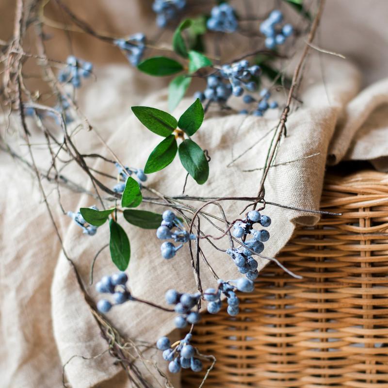 Artificial Wild Blueberry Hanging Vine, 43 inches long, featuring vibrant blue berries and lush green leaves, perfect for home decor.