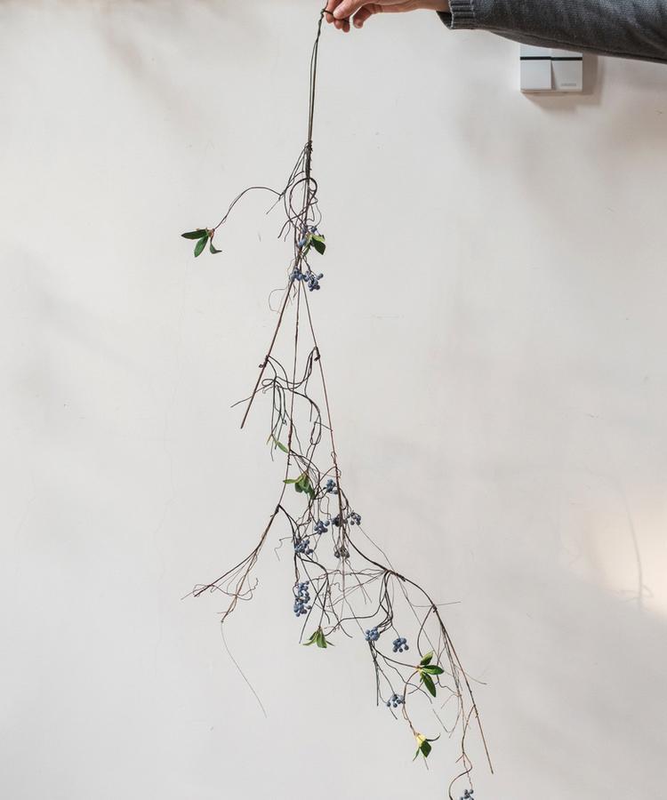 Artificial Wild Blueberry Hanging Vine, 43 inches long, featuring vibrant blue berries and lush green leaves, perfect for home decor.