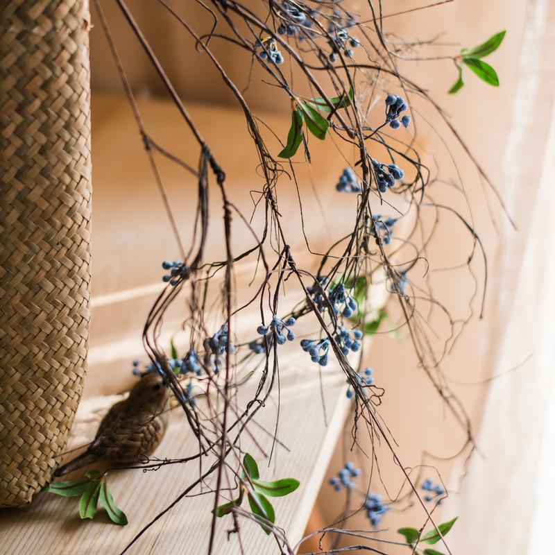 Artificial Wild Blueberry Hanging Vine, 43 inches long, featuring vibrant blue berries and lush green leaves, perfect for home decor.