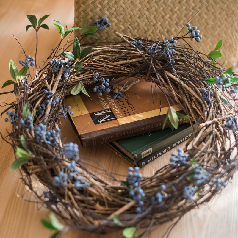 Artificial Wild Blueberry Hanging Vine, 43 inches long, featuring vibrant blue berries and lush green leaves, perfect for home decor.