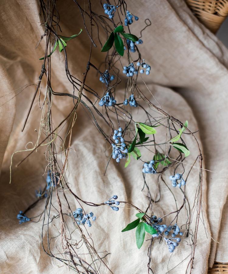 Artificial Wild Blueberry Hanging Vine, 43 inches long, featuring vibrant blue berries and lush green leaves, perfect for home decor.