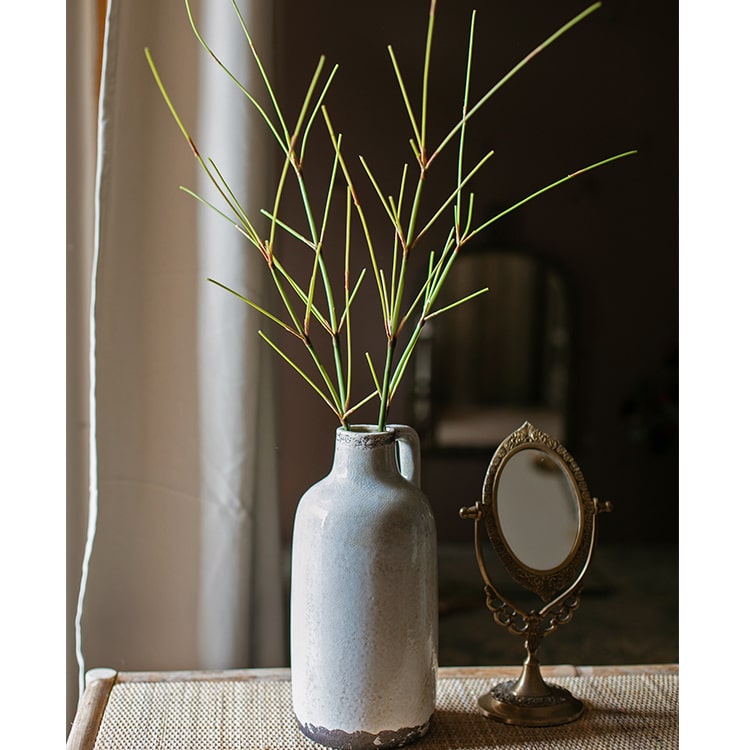 30-inch tall artificial bamboo stem with realistic green leaves, perfect for home or office decor.