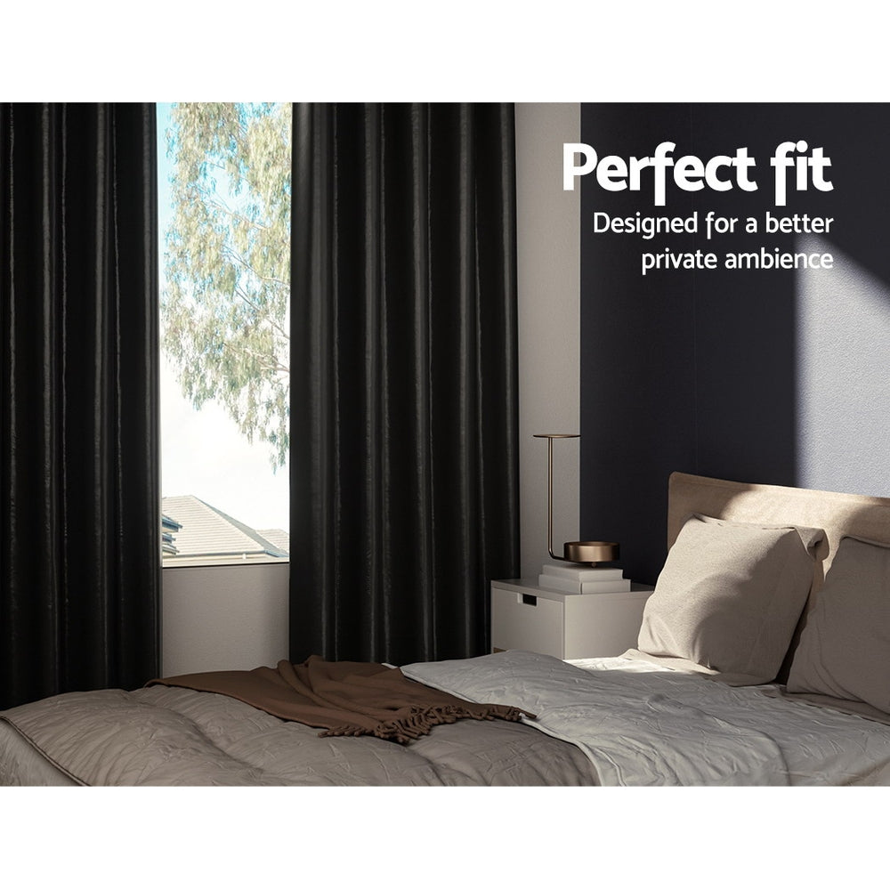 Artiss 2X Blockout Curtains in black, featuring stainless steel eyelets and soft triple weave fabric, ideal for thermal insulation and noise reduction.