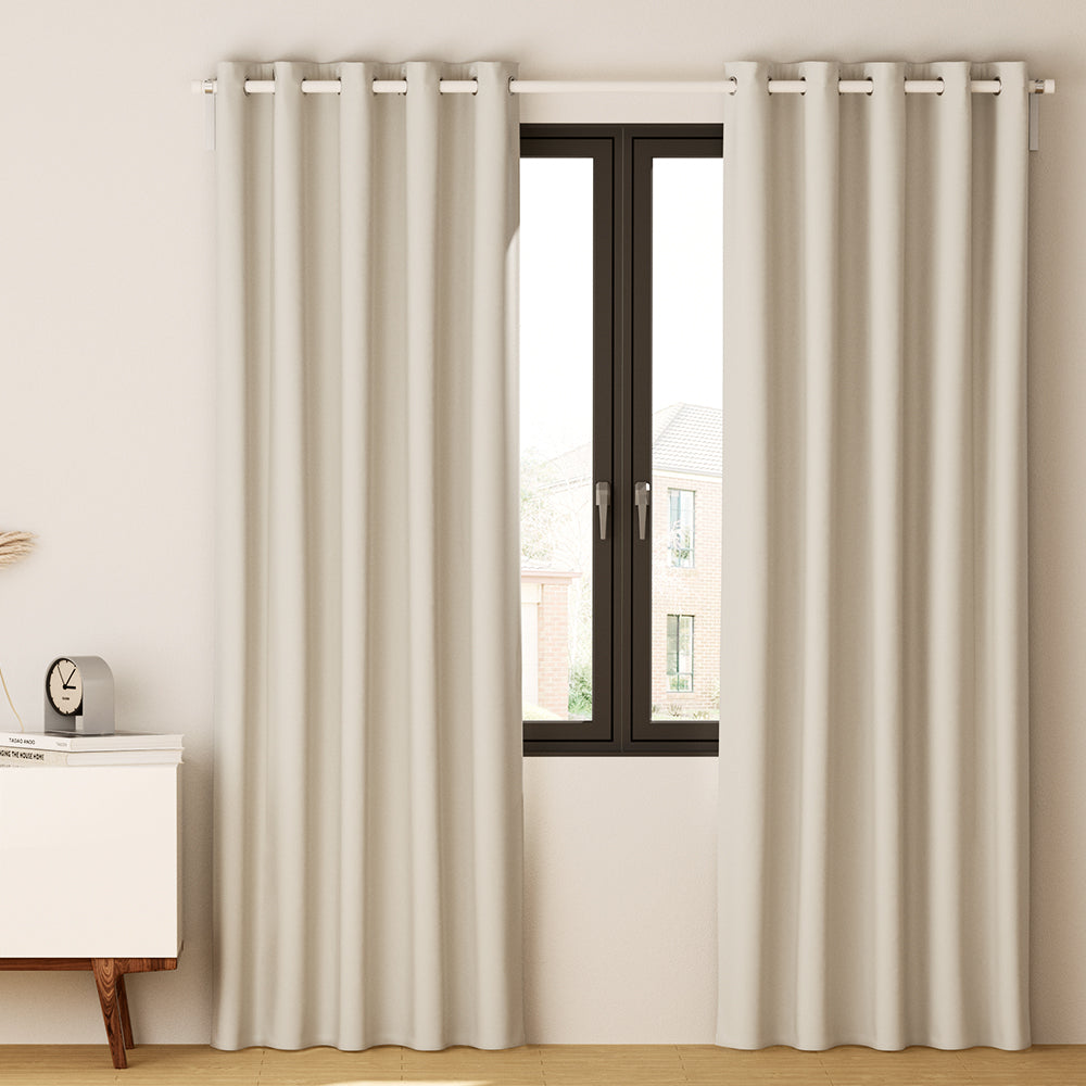 Artiss 2X Blockout Curtains in beige color, featuring stainless steel eyelets and soft triple weave fabric, ideal for light and temperature control.