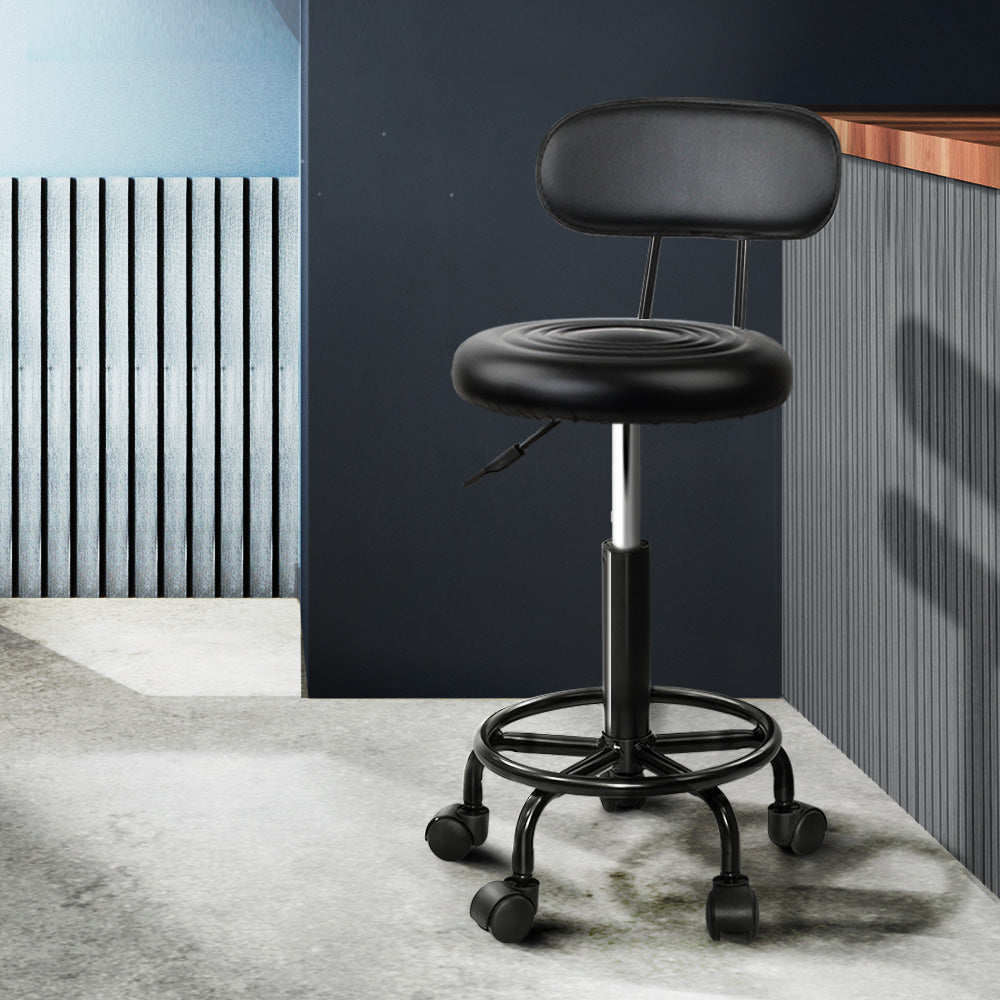 Artiss 2X Salon Stool featuring a swivel backrest, black PU leather upholstery, and a sturdy base with castor wheels, perfect for salons and studios.