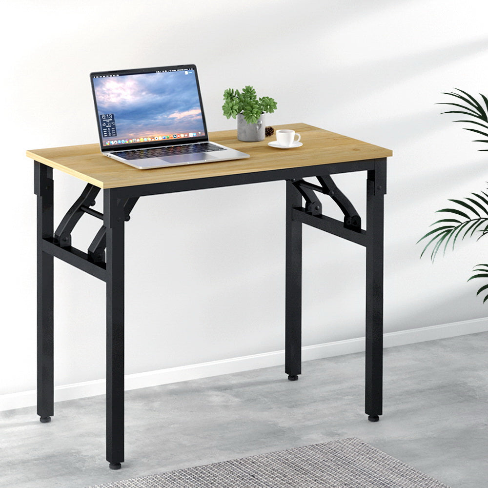 Artiss Computer Desk featuring a foldable design, sturdy steel frame, and oak particleboard surface, ideal for home office use.