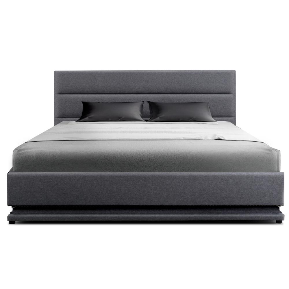 Modern grey upholstered platform bed.