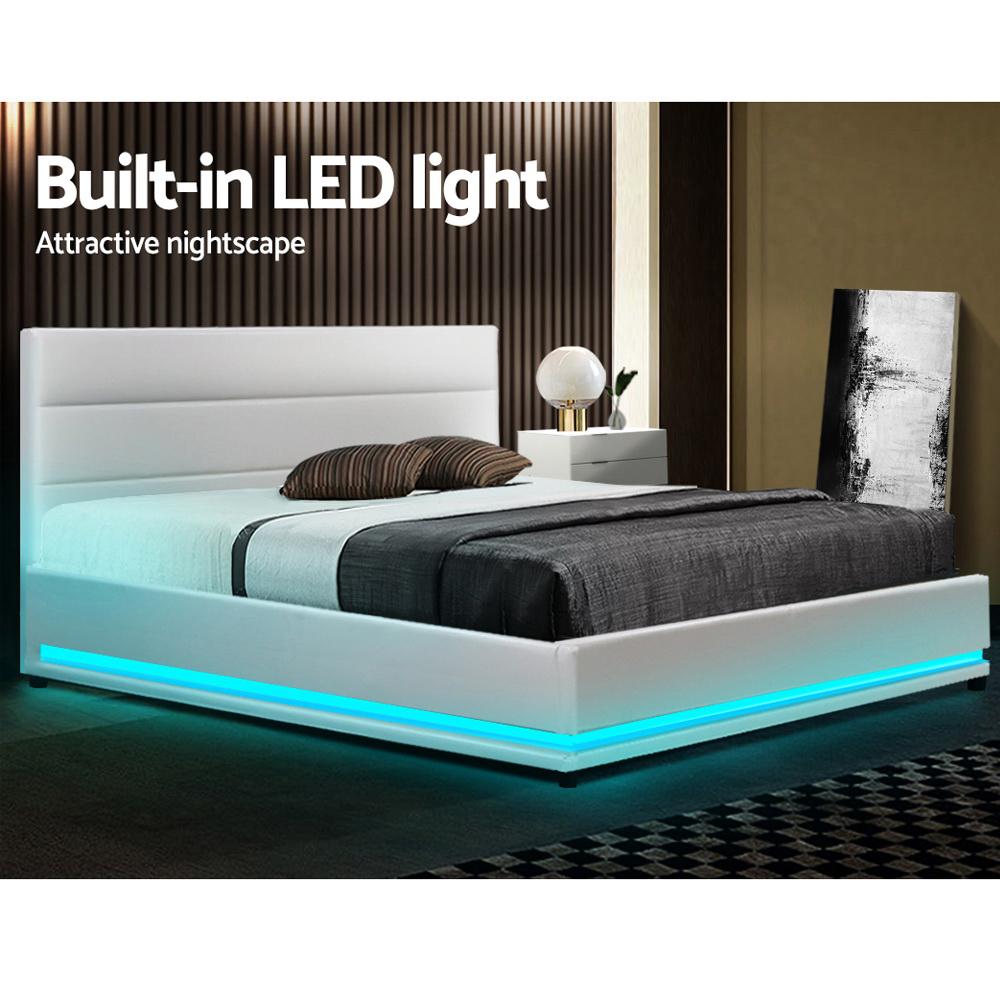 Artiss Lumi LED Bed Frame in white PU leather with gas lift storage and colorful LED lights, showcasing a modern design and spacious headboard.