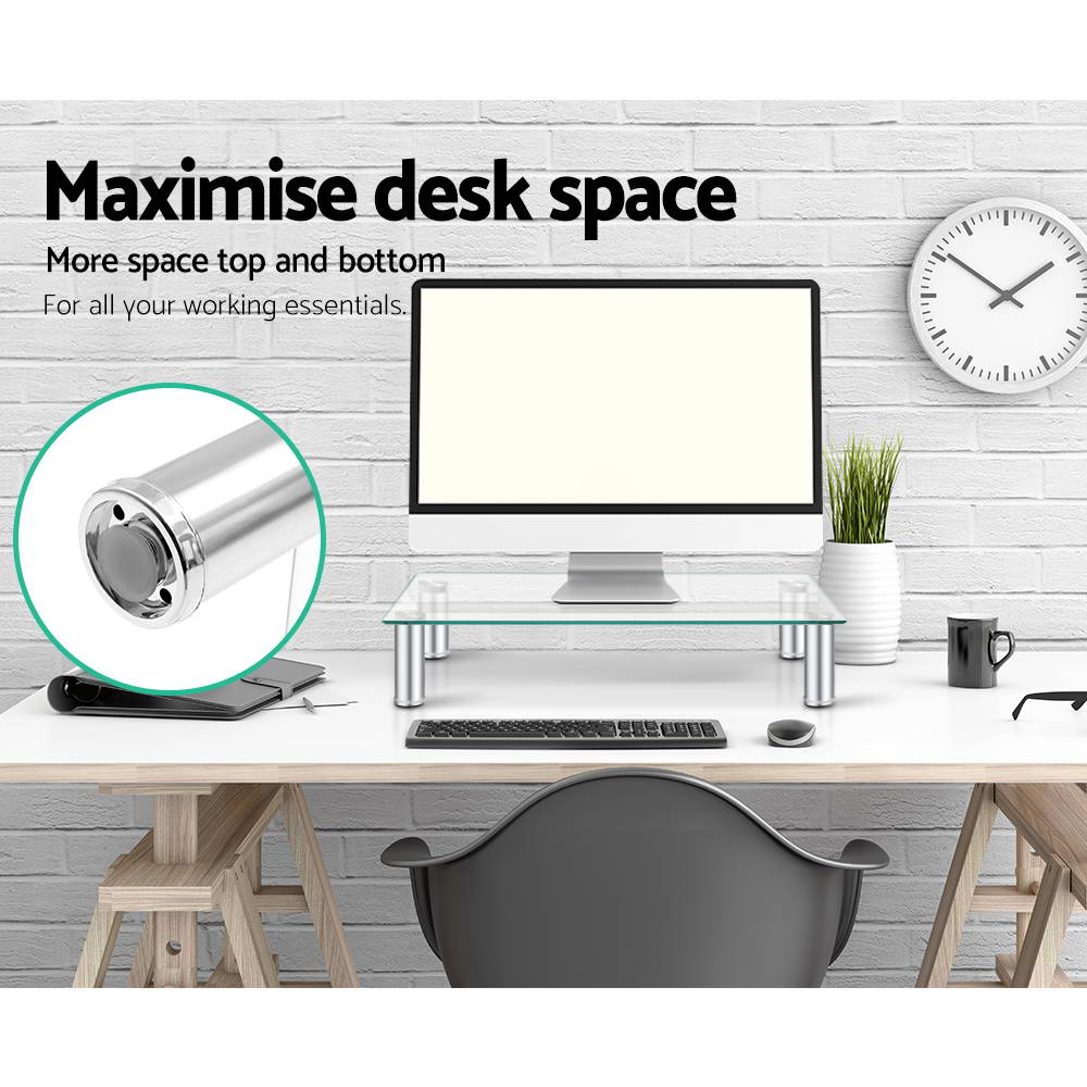 Artiss Monitor Stand Desktop Riser made of clear tempered glass with adjustable aluminum legs, designed for ergonomic workspace elevation.