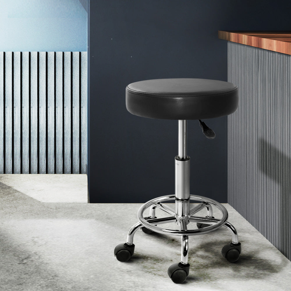 Artiss Round Salon Stool in Black PU with a sleek design, featuring a round seat, chrome base, and five castor wheels for easy mobility.