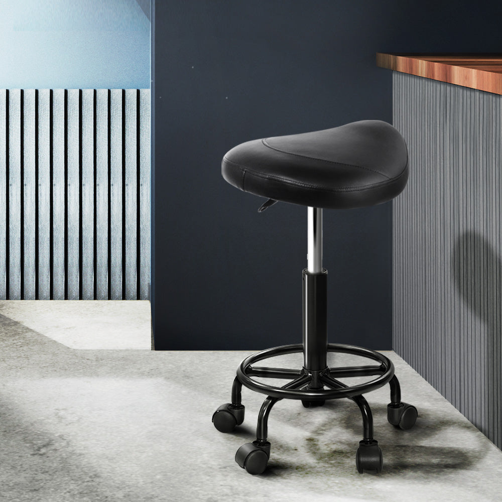 Artiss Saddle Stool Salon Chair in Black with a stylish saddle seat design, featuring PU leather upholstery and a sturdy chrome iron base.